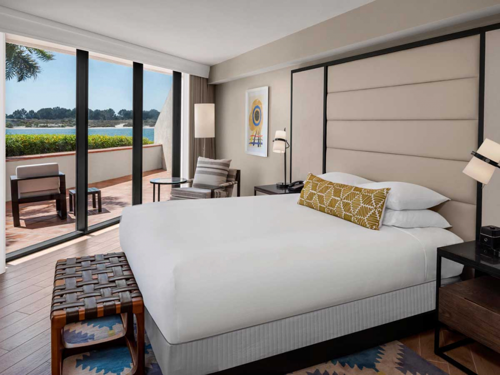 King Bed with bay view in Corner Suite at San Diego Mission Bay Resort