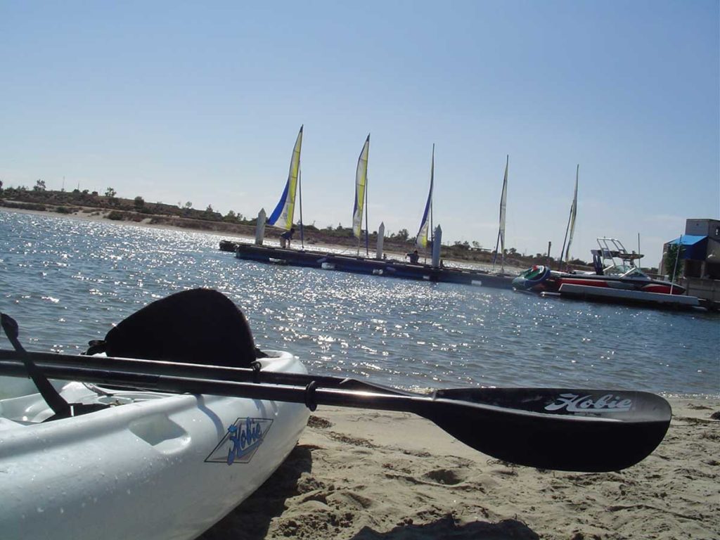 Kayaks and sailboats at San Diego Mission Bay Resort