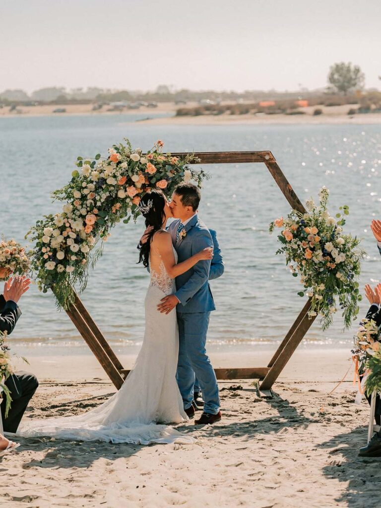 Couple Getting Married On The Beach.