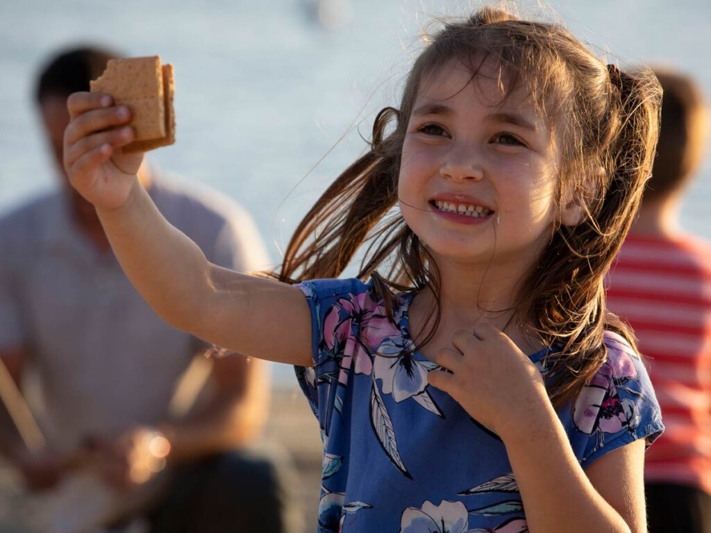 Girl Holding Up A Smore.