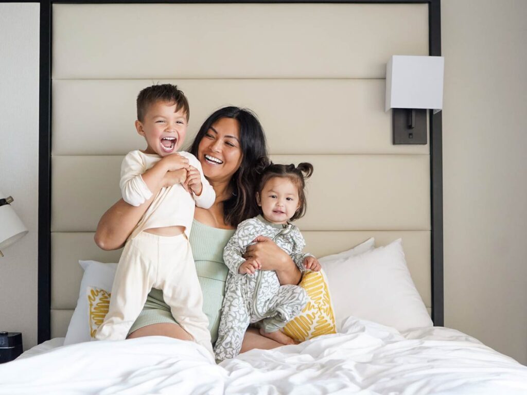 Family On Guestroom Bed