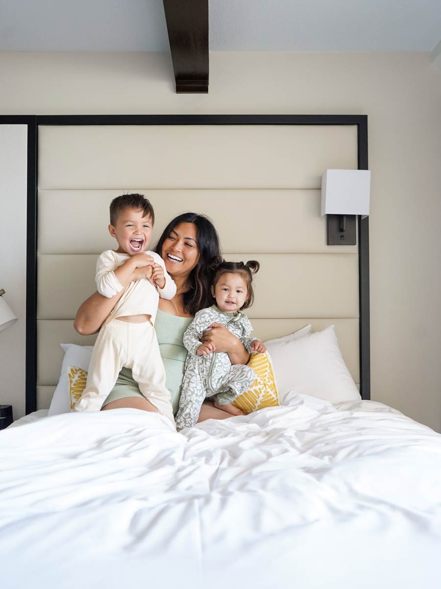 Family On Guestroom Bed