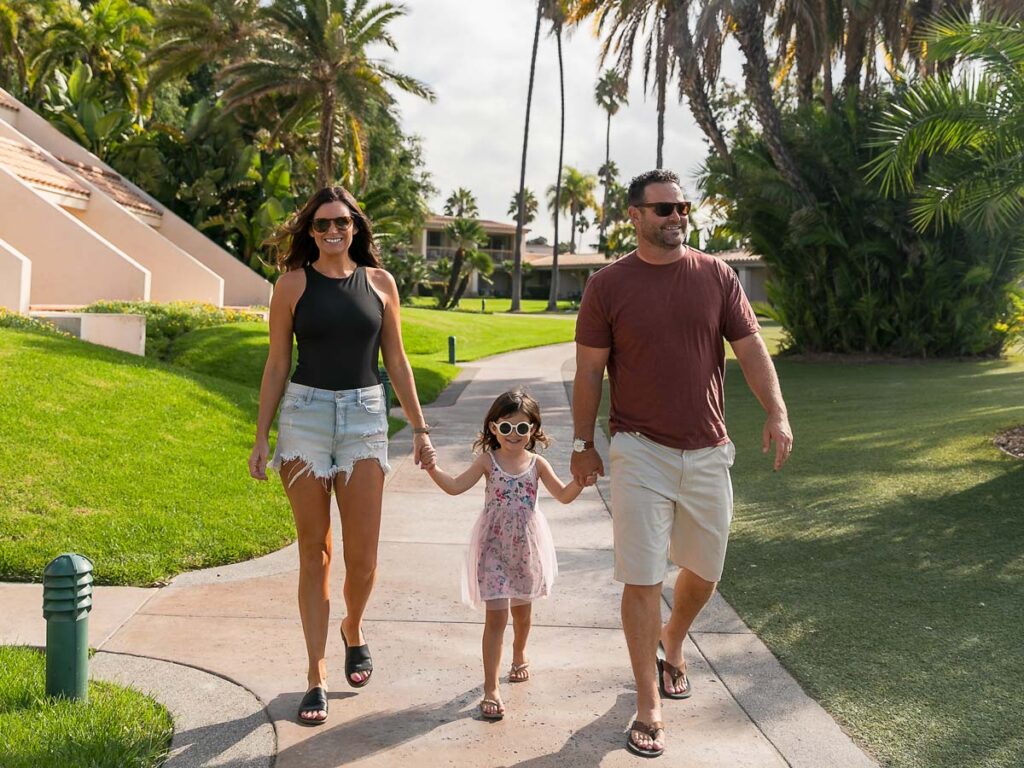 Family Walking Around At Mission Bay Resort