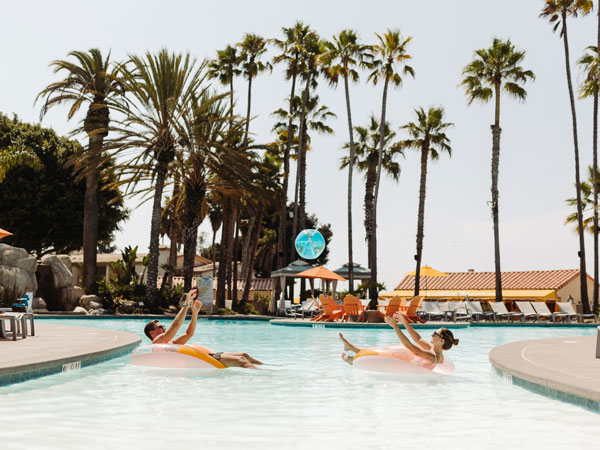 Couple Playing In The Pool