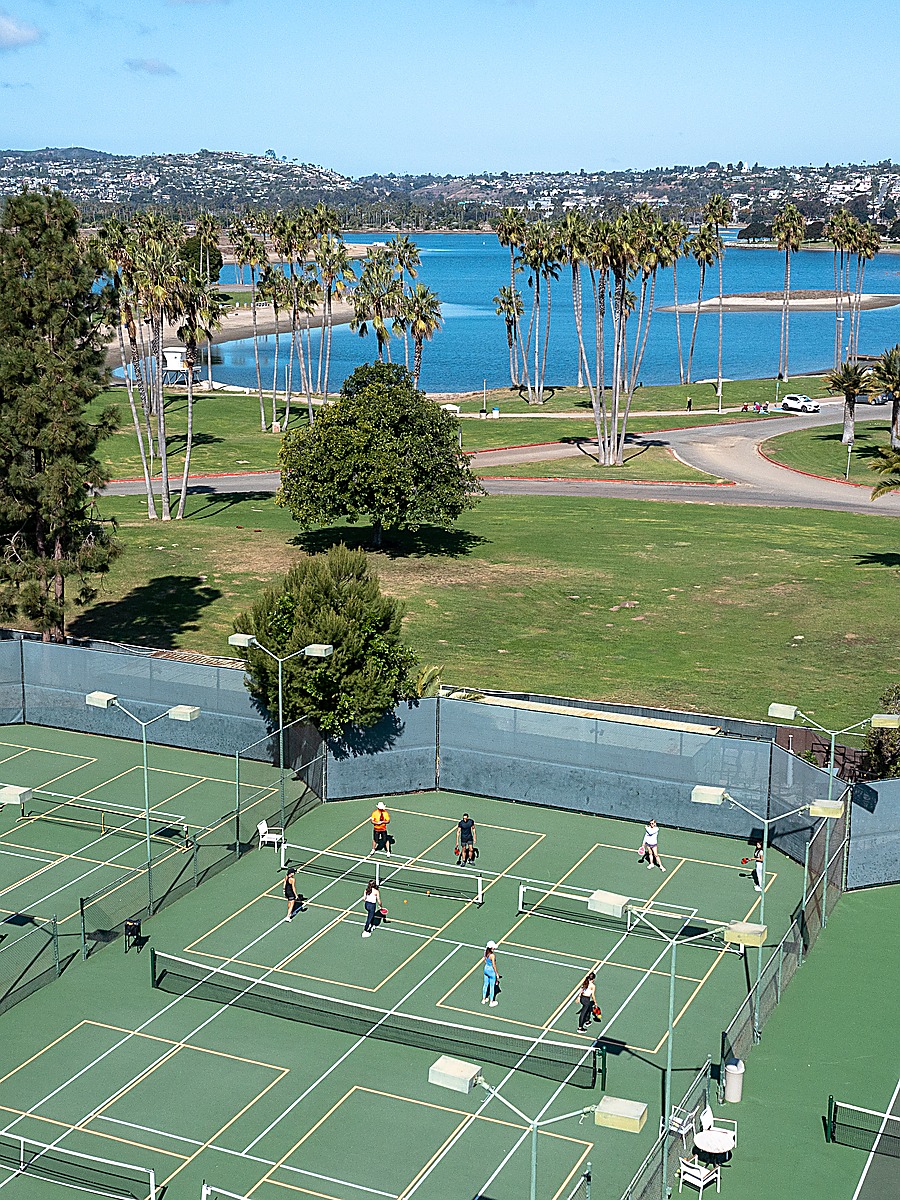 Aerial view of pickleball courts and Mission Bay waterfront at San Diego Mission Bay Resort