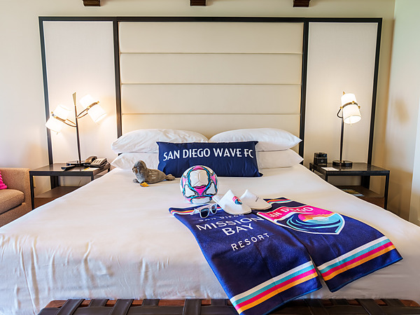 San Diego Wave FC bed amenities and beach towels at San Diego Mission Bay Resort.