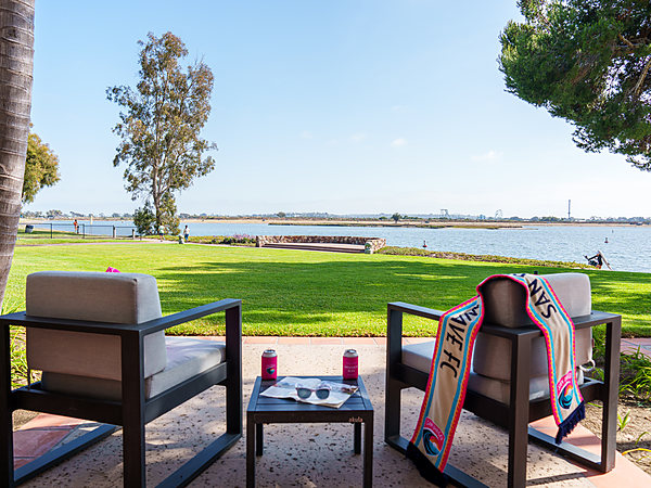 Wave FC soccer amenities on the bed of a bayfront guest room at San Diego Mission Bay Resort.