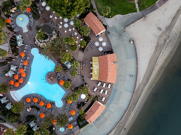 Aerial view of San Diego Mission Bay Resort pool, Solriso restaurant, and beach on Mission Bay